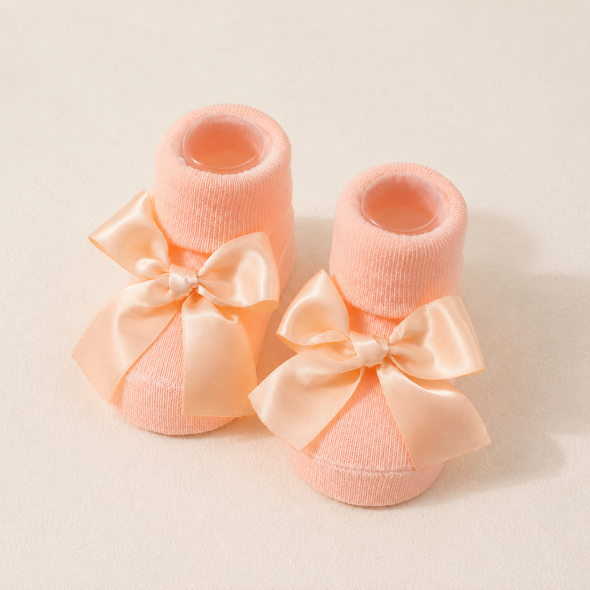 Les Précieuses – Chaussons bébé à nœud satin